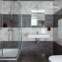 Palmira Business Club Ванная комната в номерах отеля