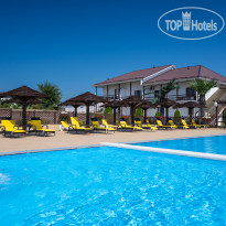 Открытый подогреваемый бассейн с мини аквапарком в Tizdar Family Resort & Spa (Тиздар) 5*