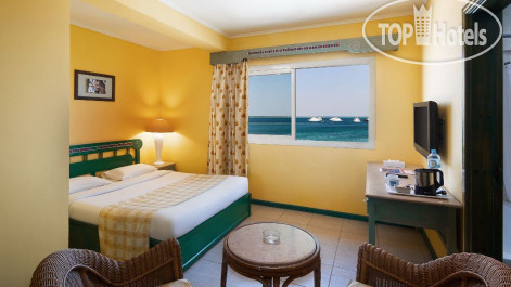 Giftun Azur Resort 3* Спальня в люксе с видом на море - Фото отеля