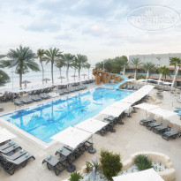 Occidental Sharjah Grand 4* Hotel Pool Area - Фото отеля