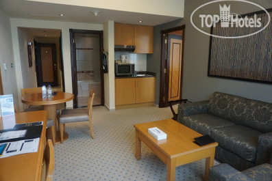 Golden Tulip Sharjah 4* Executive Junior Suite with King Bed (Living Room & Kitchenette) - Фото отеля