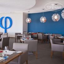 Radisson Blu Poste Lafayette Resort & Spa Mauritius Phi -  ресторан, предлагающий 