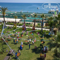Belek Beach Resort Hotel Семейный карнавал в саду.