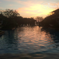 Heritage Pattaya Beach Resort 4* Вид на бассейны на закате. - Фото отеля