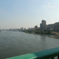 Jaz Makadina 5* Экскурсия на пирамиды в Каире. Проезжаем по мосту через Нил. - Фото отеля