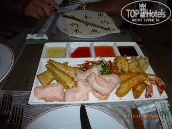 Akra Kemer 5* Блюдо азиатского ресторана - Фото отеля
