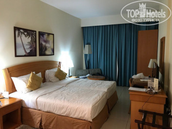 Golden Tulip Sharjah 4* Стандартный номер - Фото отеля