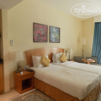 Golden Tulip Sharjah 4* номер отеля Голден Тулип - Фото отеля