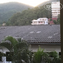 Phuket Island View 3* Это восход с моего балкона (яркость между горами) - Фото отеля