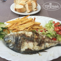 PrimaSol El Mehdi 4* Вкусная рыбка, ресторанчик напротив отеля. - Фото отеля