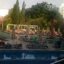 Melissi Beach 4* Раннее ранее утро.... Вроде все спят, а лежаки, смотрите, все с вещами или полотенцами - Фото отеля