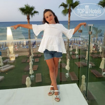 Constantinos The Great Beach Hotel 5* Веранда ресторана, где проходит ужин - Фото отеля