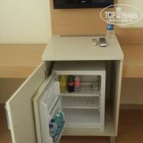 Titan Select 5* Мини-бар в номере. Вода пополняется ежедневно и бесплатно. - Фото отеля