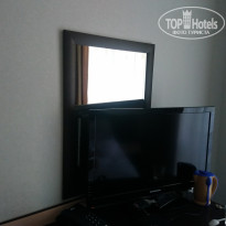 Курортный отель Олимп 3* Телевизор и зеркало - Фото отеля