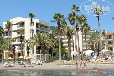 Ideal Prime Beach 5* Вид с пирса, левая половина пляжа. Слева корп."С", сзади корп."D", справа корп."B". - Фото отеля
