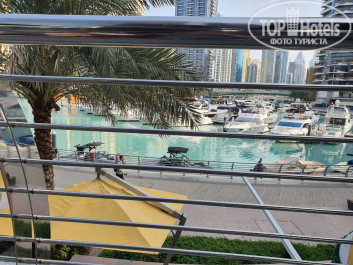 Signature Hotel Apartments & Spa Marina 4* Вид на Марину со столиков ресторана на территории отеля. - Фото отеля