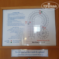 Sharjah Premiere Hotel & Resorts 3* схема-план отеля на двери в номере - Фото отеля
