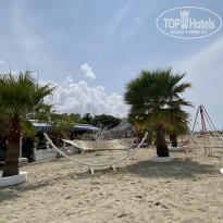 Blue Wave Suite Hotel 4* Пляж и кафе - Фото отеля