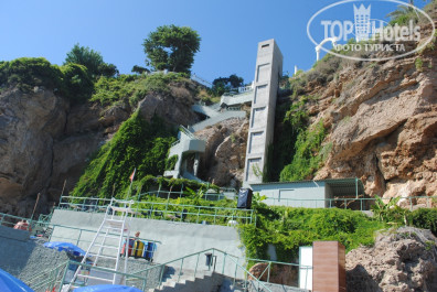 Antalya Adonis 5* Вид на верх с пляжа - Фото отеля