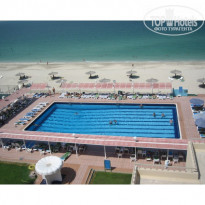 Carlton Sharjah 4* вид из номера на бассей и пляж - Фото отеля