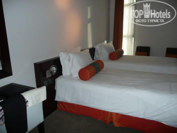 Signature Hotel Apartments & Spa Marina 4* спальня, встроенная ТВ плазма, туалетный столик - Фото отеля