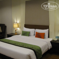 Heritage Pattaya Beach Resort 4* кровать в номере - Фото отеля