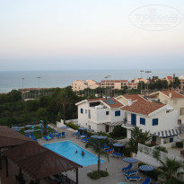 Iris Beach 3* Вид с балкона. Вечер. - Фото отеля
