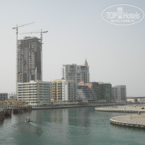 Signature Hotel Apartments & Spa Marina 4* Тут виден отель. Фото канала - разделяющего отель и пляжную сторону. - Фото отеля